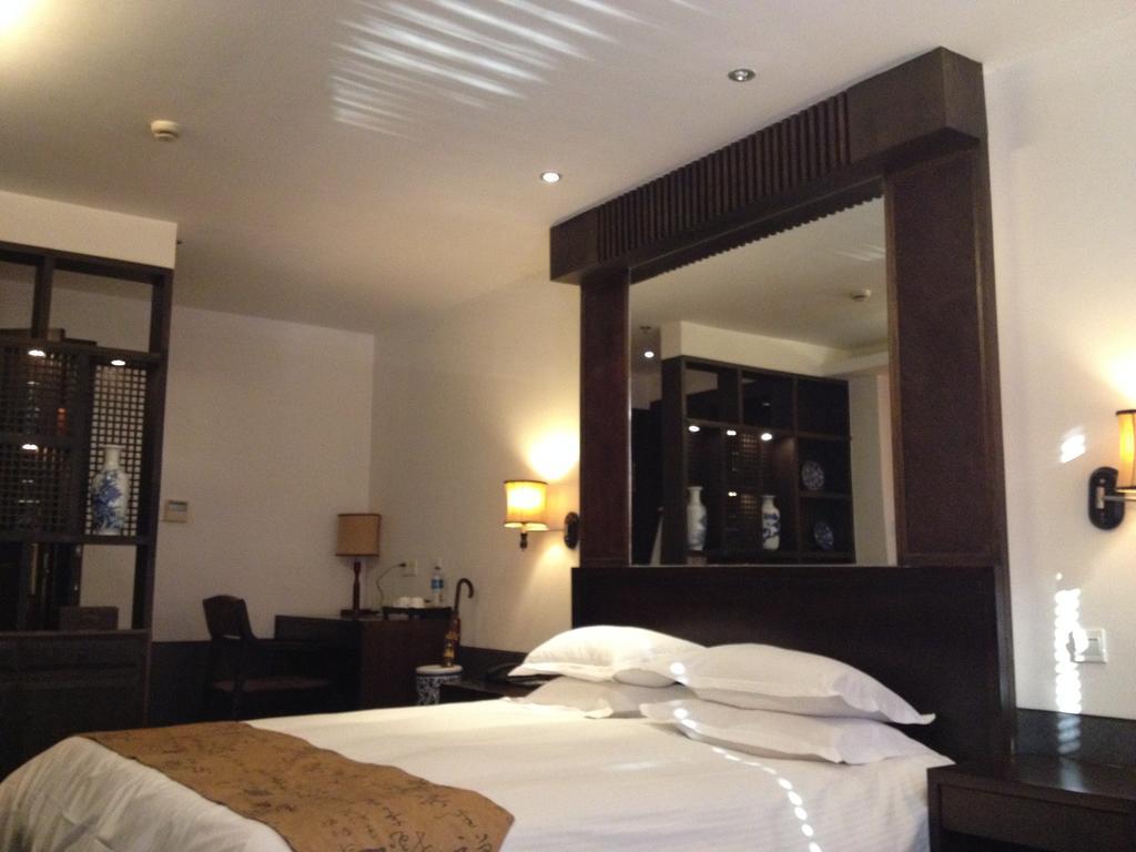 Baolong Homelike Hotel - Henglong Hotel Jingan Exteriör bild
