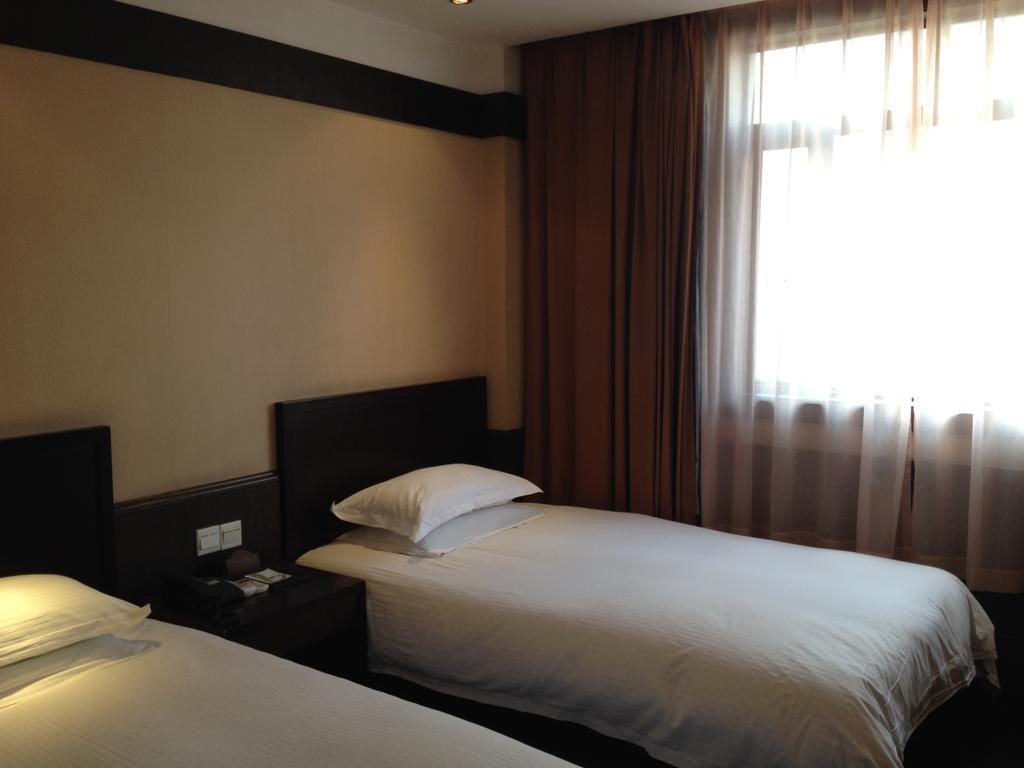 Baolong Homelike Hotel - Henglong Hotel Jingan Exteriör bild